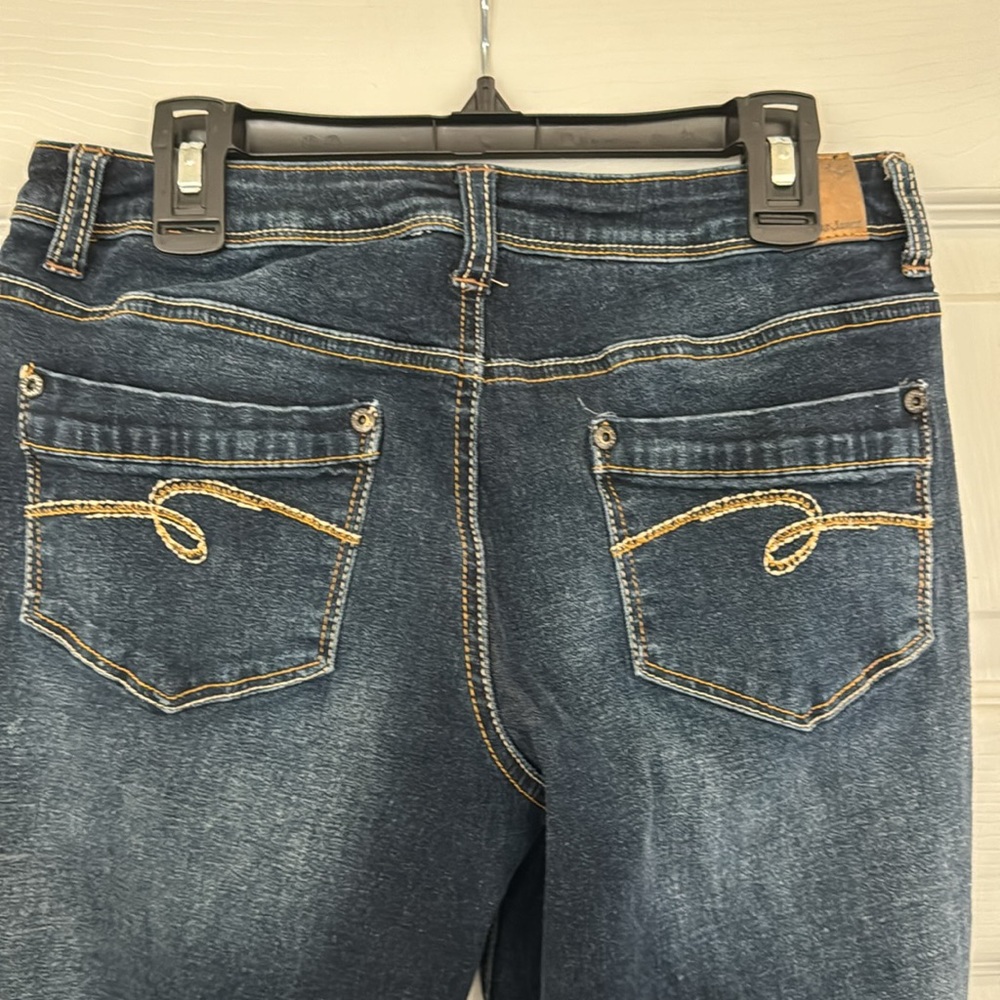 NWOT Dark blue Justice jeans with bright gold stitching